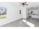 Bright living room featuring tile floors and large windows that offer natural light at 1022 Mack Ave, Orlando, FL 32805