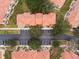 Aerial view of condo building showing building location and parking at 1118 Park Ridge Cir, Kissimmee, FL 34746