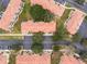 Aerial view of condo building showing building location and parking at 1118 Park Ridge Cir, Kissimmee, FL 34746