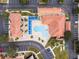 Aerial view of community pool and surrounding buildings at 1118 Park Ridge Cir, Kissimmee, FL 34746