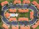 Aerial view of community layout with pool and green spaces at 1118 Park Ridge Cir, Kissimmee, FL 34746