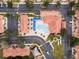 Aerial view of community pool and surrounding buildings at 1118 Park Ridge Cir, Kissimmee, FL 34746