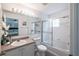 Clean bathroom with tub, shower, and updated vanity at 1118 Park Ridge Cir, Kissimmee, FL 34746