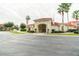 Community clubhouse with welcoming entrance and flag display at 1118 Park Ridge Cir, Kissimmee, FL 34746
