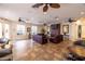 Community room with comfortable seating and large screen TV at 1118 Park Ridge Cir, Kissimmee, FL 34746