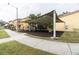 Shaded playground with slides and play structures at 1118 Park Ridge Cir, Kissimmee, FL 34746