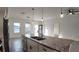 Kitchen island showcasing granite countertops and a sink with modern fixtures at 1315 Congo Dr, Kissimmee, FL 34759