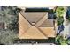 Aerial view showcasing the home's unique roofline and tile at 1320 Moss Creek Ln, Davenport, FL 33836