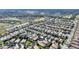 High-angle aerial view of the house and surrounding area at 1320 Moss Creek Ln, Davenport, FL 33836