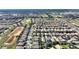 Wide aerial view showing the house's location in a residential community at 1320 Moss Creek Ln, Davenport, FL 33836