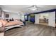 Main bedroom with sitting area and home office at 1320 Moss Creek Ln, Davenport, FL 33836