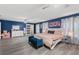 Spacious bedroom with a large bed, and plenty of natural light at 1320 Moss Creek Ln, Davenport, FL 33836