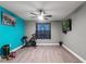 Home gym with exercise bike and plenty of floor space at 1320 Moss Creek Ln, Davenport, FL 33836