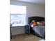 Bedroom with a desk and a bed with stuffed animals at 196 Albany Dr, Kissimmee, FL 34759