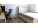 Bedroom with a bed, desk and chair at 196 Albany Dr, Kissimmee, FL 34759