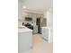 Modern kitchen with stainless steel appliances, gray cabinets, and a bright, clean design at 196 Albany Dr, Kissimmee, FL 34759