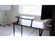 Home office with corner desk, monitor and whiteboard at 196 Albany Dr, Kissimmee, FL 34759