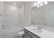 Bathroom with white bathtub, grey vanity, and white countertop at 2124 Live Oak Lake Rd, St Cloud, FL 34771