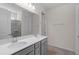 Bathroom with double vanity and walk-in shower at 2124 Live Oak Lake Rd, St Cloud, FL 34771