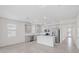 Modern kitchen with gray cabinets, stainless steel appliances, and an island at 2124 Live Oak Lake Rd, St Cloud, FL 34771