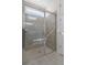 Bright walk-in shower with tile surround at 2124 Live Oak Lake Rd, St Cloud, FL 34771