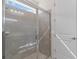Walk-in shower with glass enclosure and tile surround at 2124 Live Oak Lake Rd, St Cloud, FL 34771