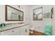 Modern bathroom with granite countertops and white cabinets at 2243 Wyndham Palms Way, Kissimmee, FL 34747