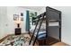 Bedroom with a bunk bed and colorful rug at 2243 Wyndham Palms Way, Kissimmee, FL 34747