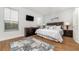 Spacious bedroom with a king-size bed and en-suite bathroom at 2243 Wyndham Palms Way, Kissimmee, FL 34747