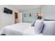 Bright bedroom with a comfortable bed and stylish decor at 2243 Wyndham Palms Way, Kissimmee, FL 34747