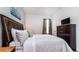 Well-lit bedroom with a comfortable bed and ample closet space at 2243 Wyndham Palms Way, Kissimmee, FL 34747