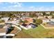 Aerial view of house with pool and fenced backyard near lake at 2302 Aberdeen Ct, Kissimmee, FL 34743