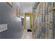 Clean bathroom with shower and exterior access at 2302 Aberdeen Ct, Kissimmee, FL 34743