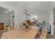 Bright dining room with a table and chairs, adjacent to kitchen at 2302 Aberdeen Ct, Kissimmee, FL 34743