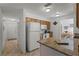 Kitchen boasts granite countertops and wood cabinets at 2302 Aberdeen Ct, Kissimmee, FL 34743