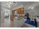 Bright kitchen features granite countertops and ample cabinetry at 2302 Aberdeen Ct, Kissimmee, FL 34743