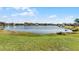 Beautiful lake view from the backyard at 2302 Aberdeen Ct, Kissimmee, FL 34743