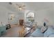 Living room with vaulted ceilings and a comfortable sitting area at 2302 Aberdeen Ct, Kissimmee, FL 34743
