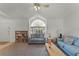 Cozy living room with a large window and comfortable seating at 2302 Aberdeen Ct, Kissimmee, FL 34743