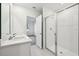 Clean bathroom with double vanity and a large shower at 2315 White Tail St, Davenport, FL 33837