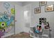 Fun bedroom with playful wall art and built-in storage at 2452 Sweetwater Club Cir # 27, Kissimmee, FL 34746