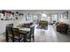 Dining area with dark wood table and chairs at 2452 Sweetwater Club Cir # 27, Kissimmee, FL 34746