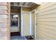 Condo entryway with door and brick accents at 2452 Sweetwater Club Cir # 27, Kissimmee, FL 34746