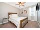 Cozy bedroom with a double bed and neutral decor at 250 Pendant Ct, Kissimmee, FL 34747