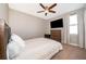 Bedroom with queen-size bed and ceiling fan at 250 Pendant Ct, Kissimmee, FL 34747