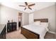 Bedroom with a full-size bed and ceiling fan at 250 Pendant Ct, Kissimmee, FL 34747
