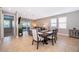 Dining room with dark wood table and chairs, near kitchen at 250 Pendant Ct, Kissimmee, FL 34747