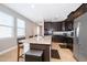 Modern kitchen with stainless steel appliances and granite countertops at 250 Pendant Ct, Kissimmee, FL 34747