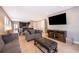 Spacious living room with an open floor plan and views of the kitchen and dining area at 250 Pendant Ct, Kissimmee, FL 34747