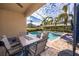 Inviting pool area with patio furniture at 250 Pendant Ct, Kissimmee, FL 34747